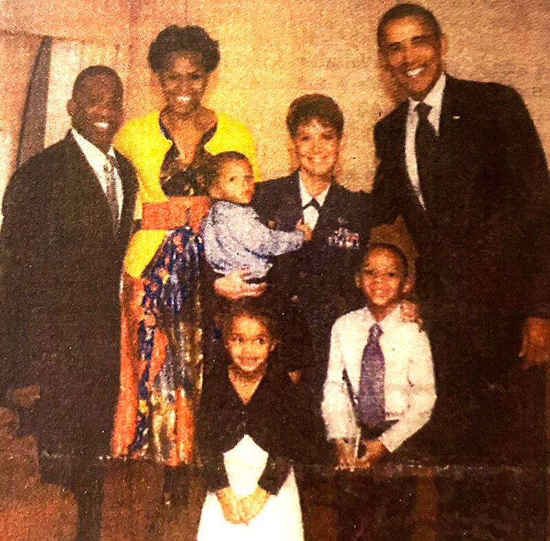 President Obama and his family share a moment with &ne;&ne;Sergeant Paramore, at left.