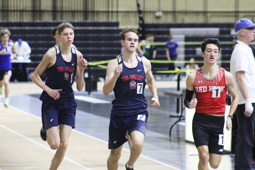 Craig Costa, middle, and Van Furman, left, shared first and second in both the 1000m and 1600m races.