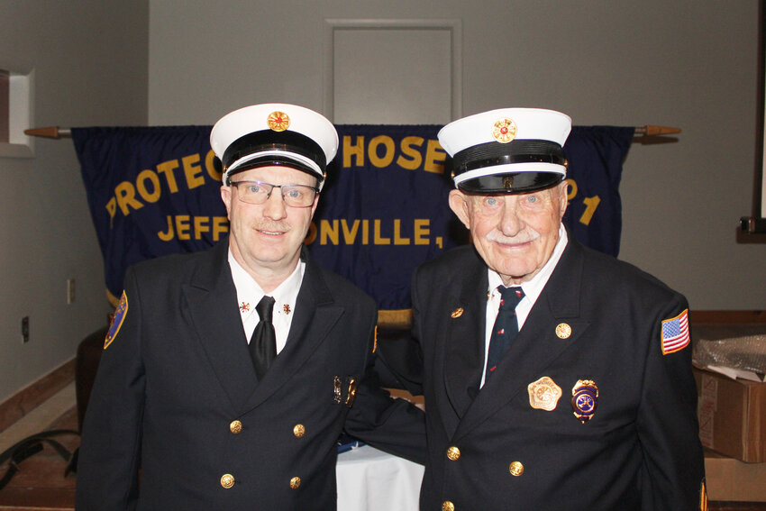 Ed Puerschner, left, and his father Tom Puerschner celebrated Tom&rsquo;s 60 years of active service in the Jeffersonville Fire Department.