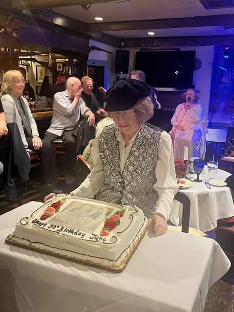 June Donohue celebrates her 90th birthday with a delicious cake.