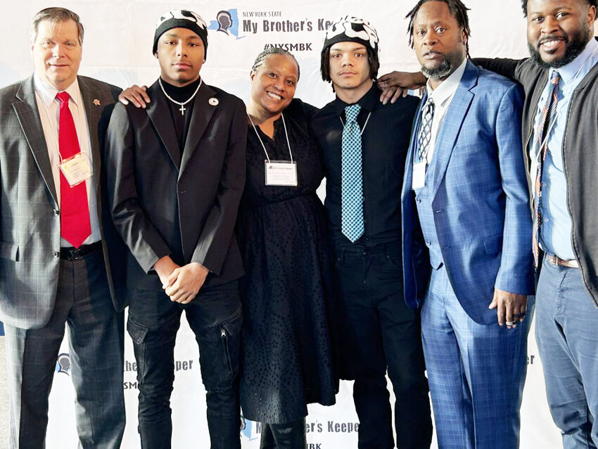 Monticello High School Principal Gary Furman, MBK Fellows Judah Brown and Xavean Mitchell, MCSD Director of Counseling, Social-Emotional Learning, and Student Services Tokinma Killins, and MBK Mentors Naquan Holman, and David Jett pose at the 2024 Stand and Deliver event.