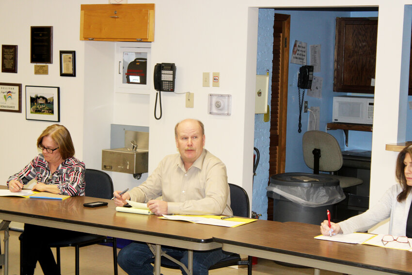 Town of Callicoon Supervisor Tom Bose listens at the board meeting on Monday in which the town moved forward with the demolition of the old Callicoon Center fire building.