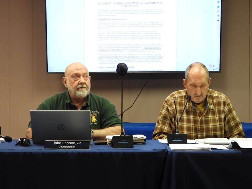 Town Board member John Lennon Jr., left, expressed his dissatisfaction with the projected location of the Walnut Mountain Pavilion project as Supervisor Frank DeMayo was wary of additional costs that would come with research into another site.