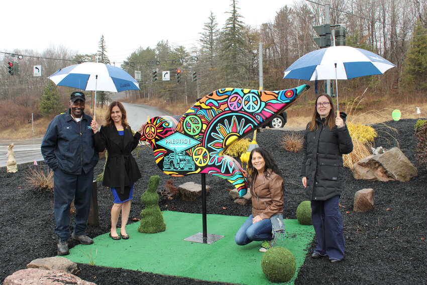 The rainy weather didn&rsquo;t hamper the spirit of the newest addition to the Sullivan Catskills Dove Trail. From left: Will Westmoreland and Chris Caruso  of Prestige Towing, artist Kim Simons and Isabel Braverman of the Sullivan Catskills Visitors Association (SCVA).