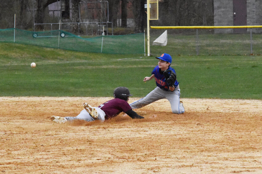 Anthony Zamenick safely slides into second with a steal after leading off the game with a single.