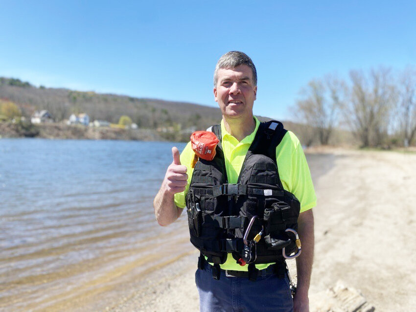 Assistant Director of Public Works for the City of Port Jervis, Wayne Addy, promoting Wear Your Life Jacket to Work Day at West End Beach.
