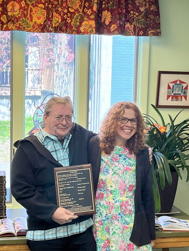 The poem, &ldquo;A Day Off&rdquo; was written as a form of therapy for Vern Francisco. At right is Dr. Sharon Kennedy-Nolle, Sullivan County Poet Laureate.