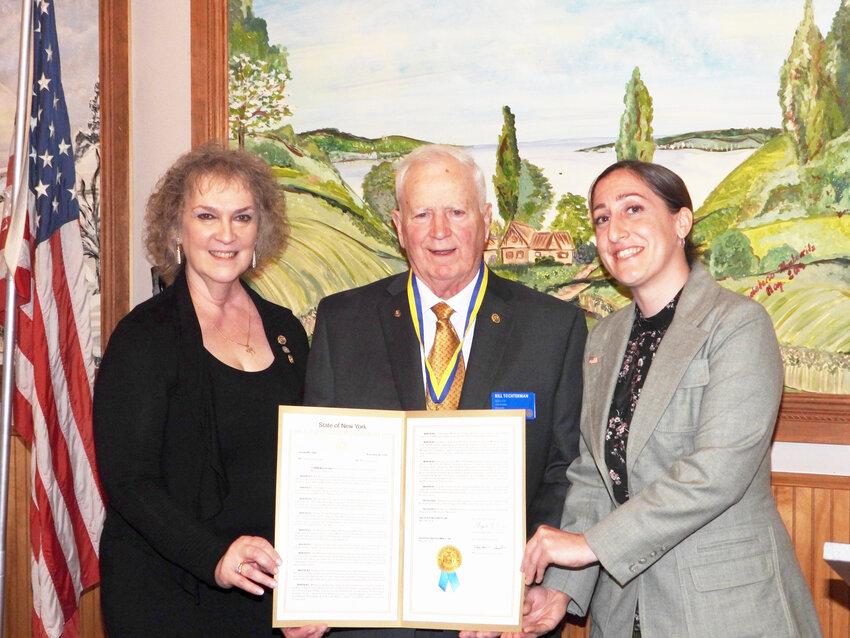 From left, Monticello Rotary President-Elect Lori Orestano-James on behalf of Assemblywoman Aileen Gunther, Centennial Celebration Committee Chair Bill Tochterman and Camille O&rsquo;Brien from Senator Peter Oberacker&rsquo;s office.