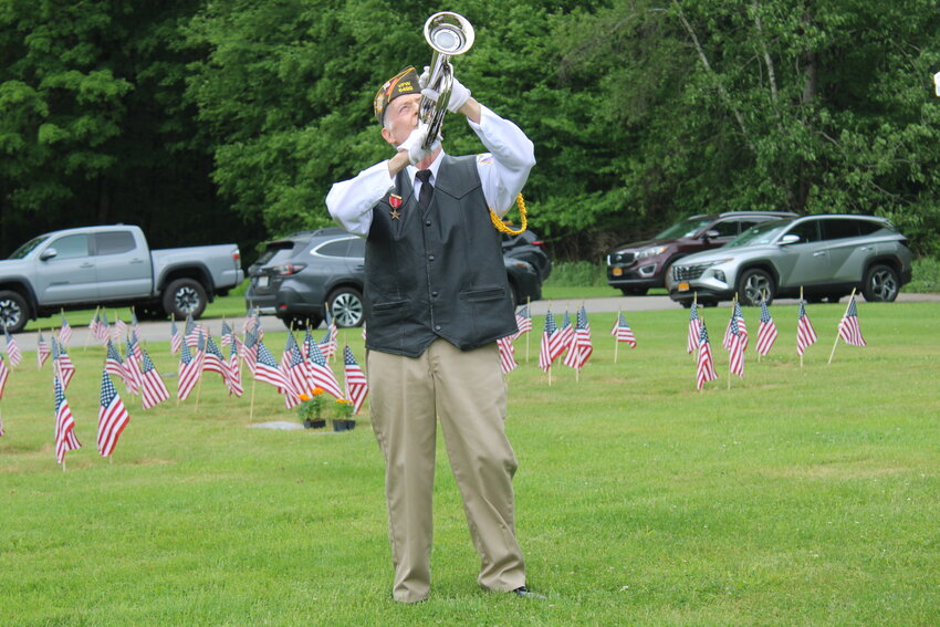 Veteran Randy Peers of VFW Post 5499 performed Taps at the Sullivan County Veterans Cemetery.