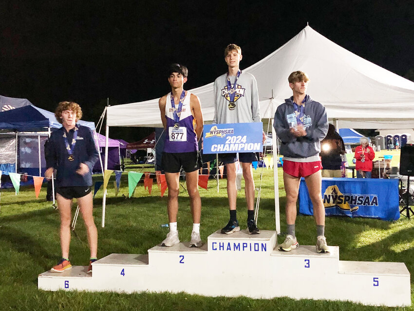Van Furman took the State title in the 3200m last Friday night before waking up and competing in the 3000m Steeplechase on Saturday morning and finishing second.