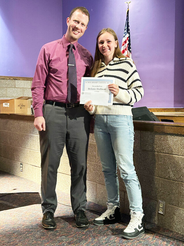 TVCSD teacher and Time and the Valleys Museum Trustee Matt Haynes with Delanie Hoffman at awards ceremony at Tri-Valley High School.