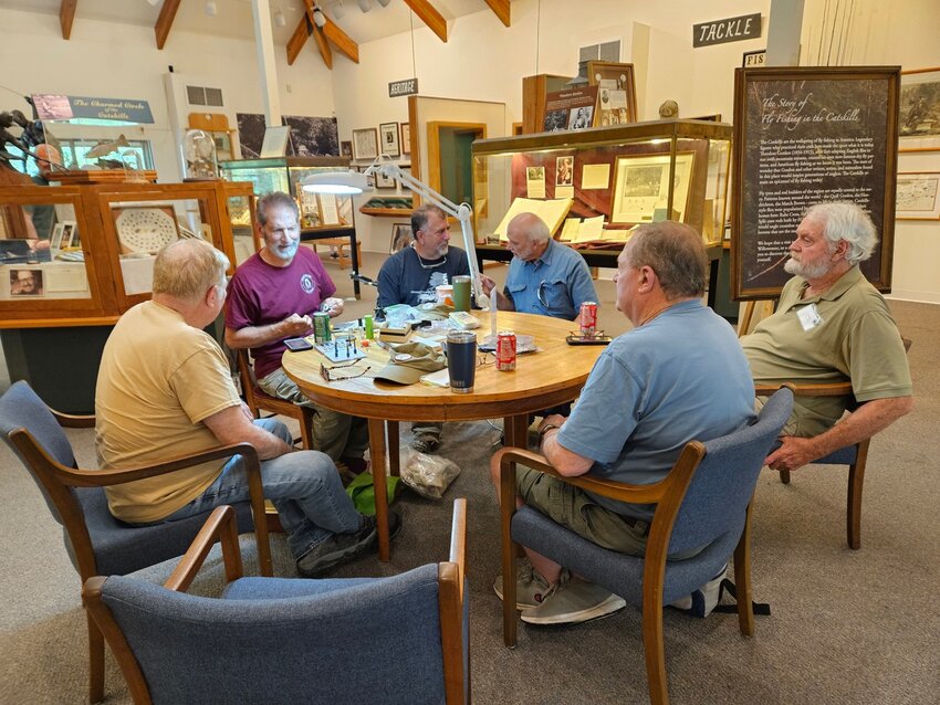 Visitors came to watch Chuck tie his beautiful Catskill flies. Pictured around the table, from left to right: Mark Sturtevant, Chuck Coronato (guest tyer), John Fusco, Dave Catizone, Ed Walsh, Tom Mason.