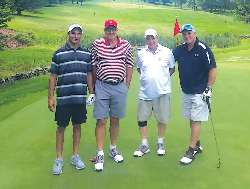Ken Cohen, left, and Barry Winter, second from left, enjoy the No. 2 spot on the Sullivan County Democrat All-time Top Teams. Here they are playing with Marvin Newberg and Sam Hillman, right.