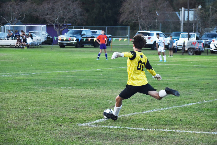 Monticello Boys’ goalie sends the ball back to midfield.