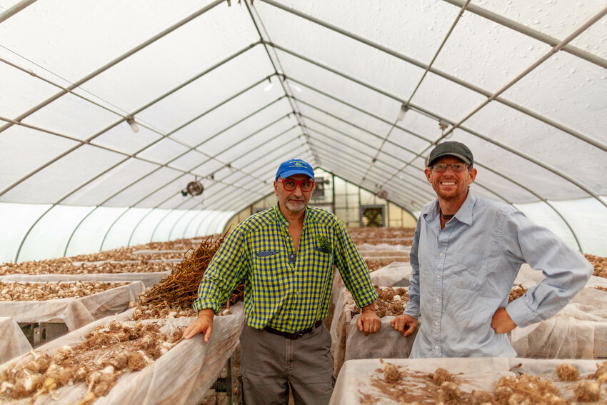 On the left, Chef Cesare Casella, Chief Department of Nourishment Arts (DNA) with Alex Needham, the farm director with a recent harvest that will be soon meals for the residents of The Center for Discovery.