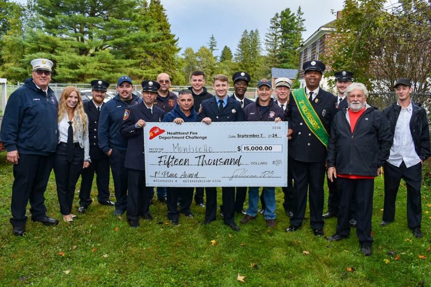 Members of the Monticello Fire Department with 1st place award.