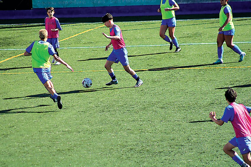 Hudson Valley Athletic Club  members playing soccer.