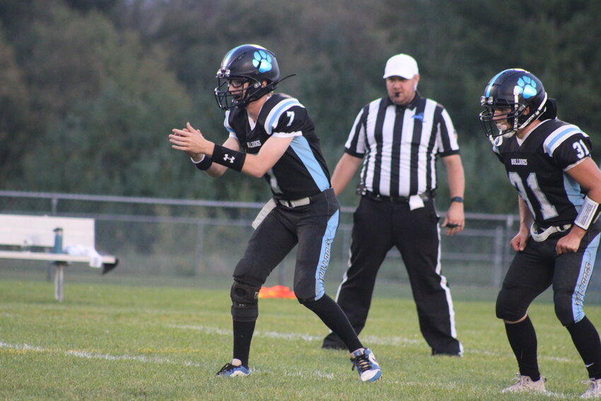 Sullivan West quarterback Adam Ernst, left, and running back Alec Hubert. The Bulldogs host Tri-Valley on Saturday at 1 p.m.