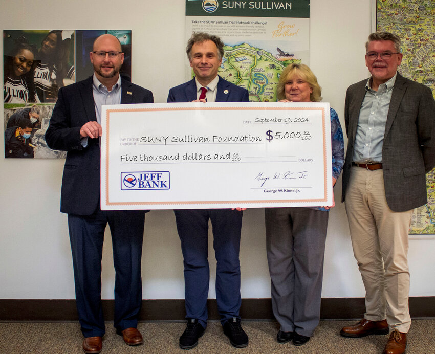 SUNY Sullivan Foundation receives a $5K grant from Jeff Bank. From left is President and CEO of       Jeff Bank George W. Kinne, Jr., SUNY Sullivan President Dr. David Potash, VP/Branch Manager of Jeff Bank Bertha Donohue and VP/Commercial Loan Officer of Jeff Bank Heinrich Strauch.