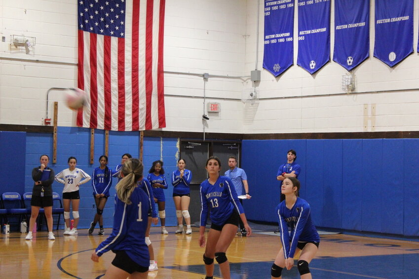 Panthers Sophomore, Reilly Schloika getting ready for a dig in Monday night’s game against the Comets. Teammates Deeanna Mann and Taylor Crumley look to back her up.