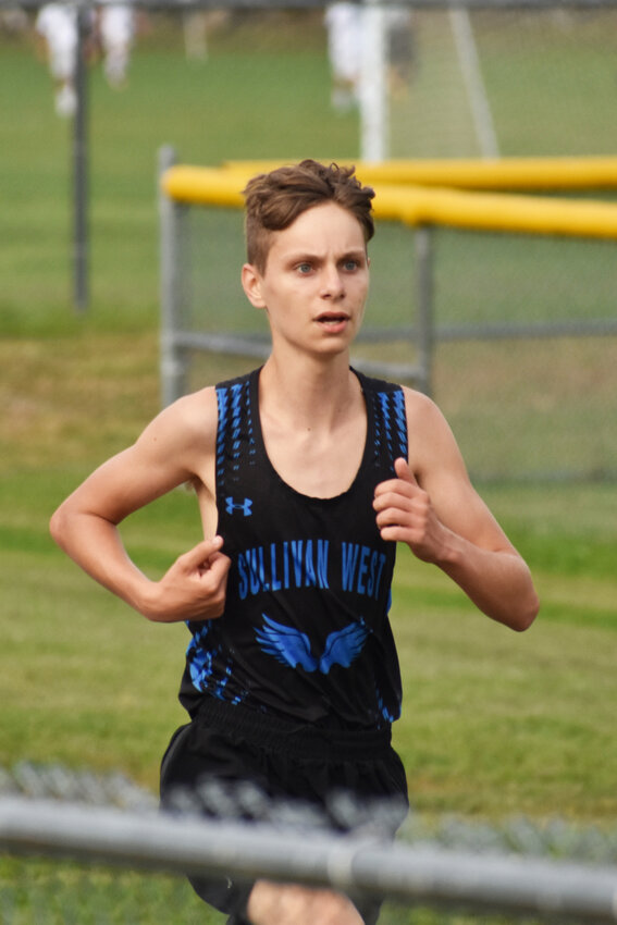 Solo runner, Cole Flynn  of Sullivan West in the final lap.