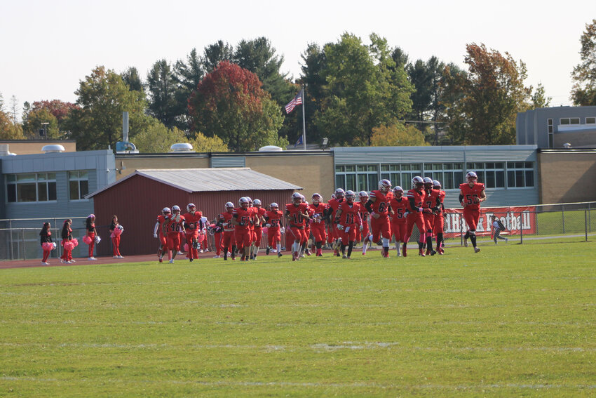 The RedHawks take the field pregame before their league matchup against New Paltz.