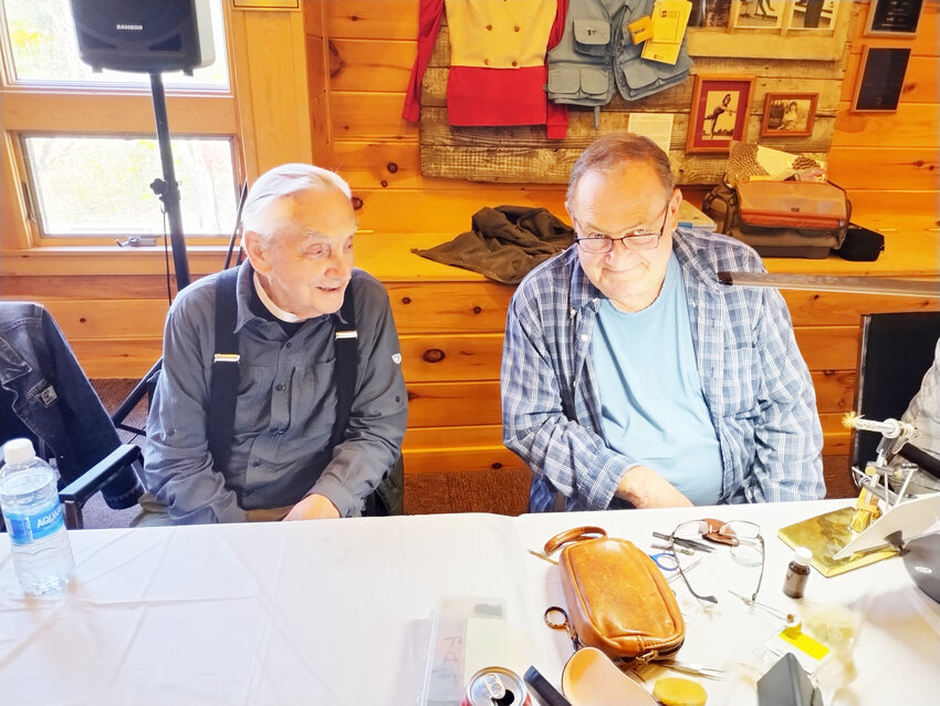 Ed Van Put and Tom Mason share a happy moment at the Fly Tyers Roundtable.