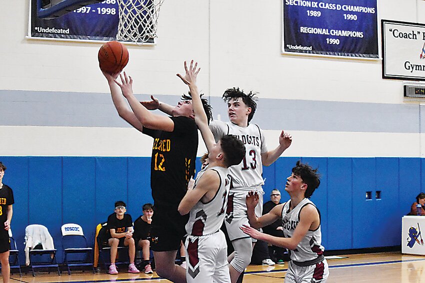 James Deyermond powered through Wildcat defenders all night as he led the Yellowjackets with 18 points in the 48-42 victory.