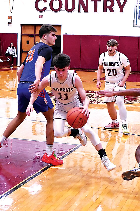 Ben Johnston drives past a defender.