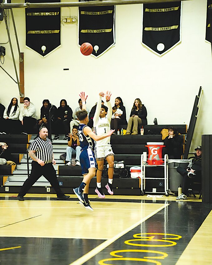 Donovan Hart of Fallsburg hitting one of his two, 3-point field goals on his way to a game-high 23 in the loss against Burke.