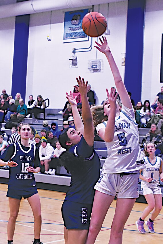 Ella Herbert goes up for a layup back in December in Sullivan West&rsquo;s win over Burke Catholic.