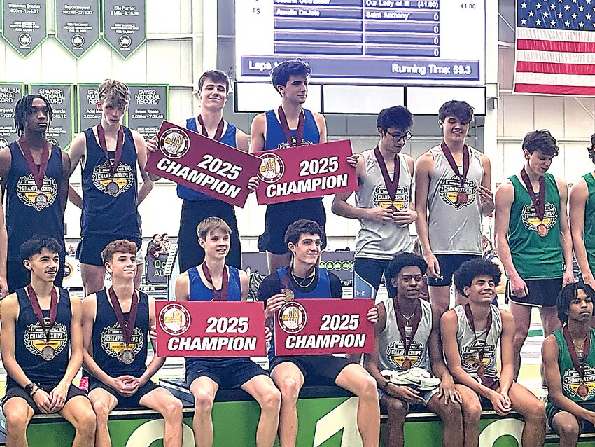 Van Furman, center left joined by his Section IX relay teammates after their first place finish this weekend at the Ocean Breeze Indoor Track &amp; Field Championships.