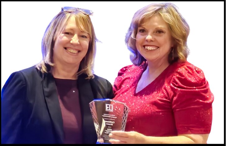 Mary Bakalis, Association Executive of the Sullivan County Board of Realtors, left, presents Cathleen Breen with her ‘Realtor of the Year’ award.