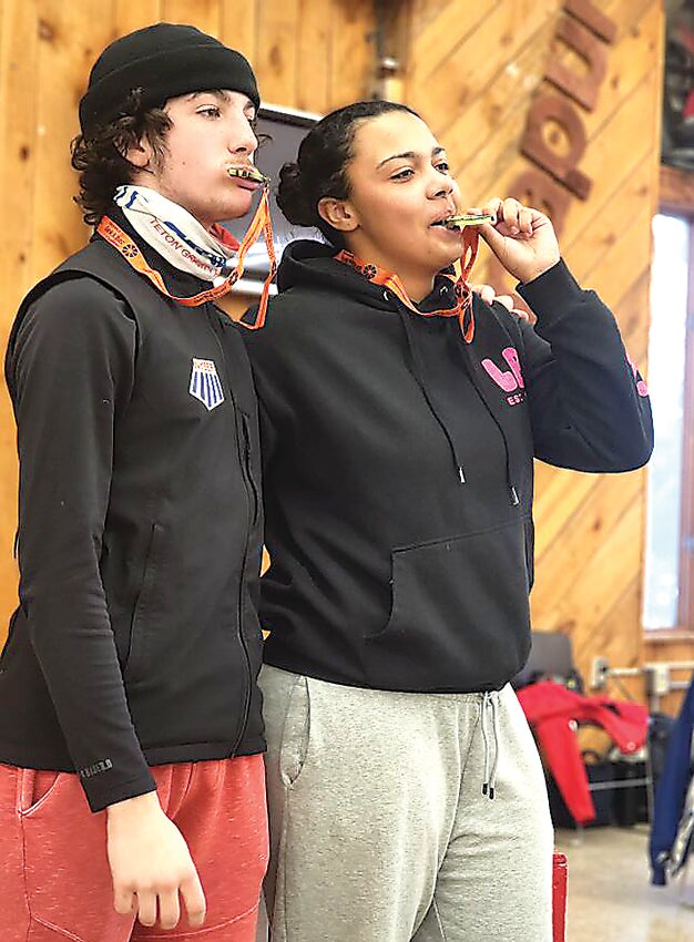 Sam Rein left, with Alexis Heins after winning the Section IX ski titles!