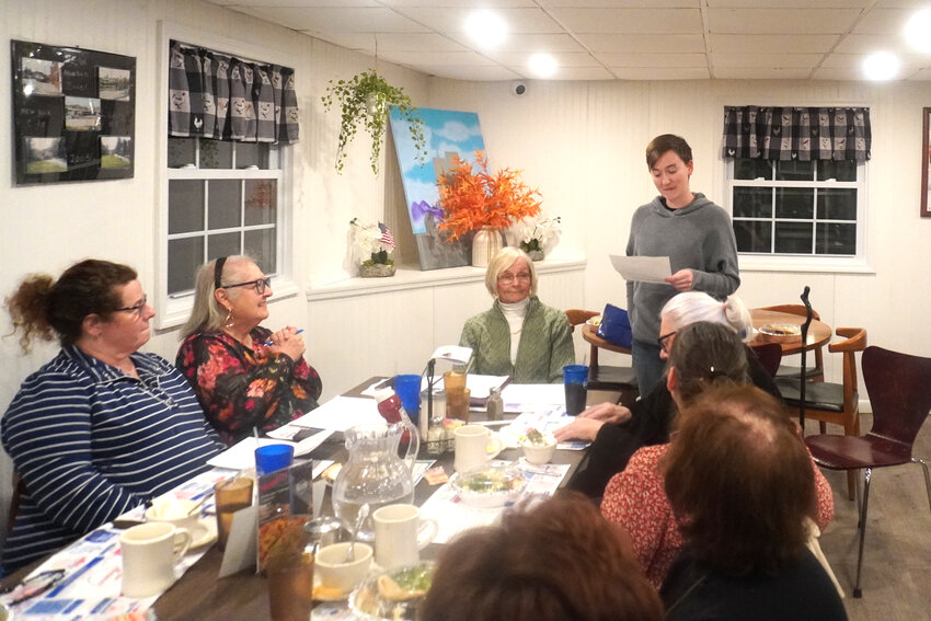 Aaron Denman, PWSC recording secretary, reads her presentation about Lizzie Halliday during last Monday&rsquo;s group meeting at Munson Diner in Liberty.