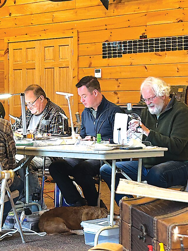 A quiet corner with CFTGuild Tyers Tom Mason, Phil Street, and Ed Walsh busy at their craft.