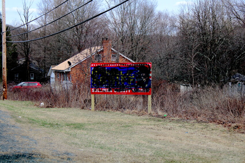 The defaced sign, located along Route 55 in Grahamsville.