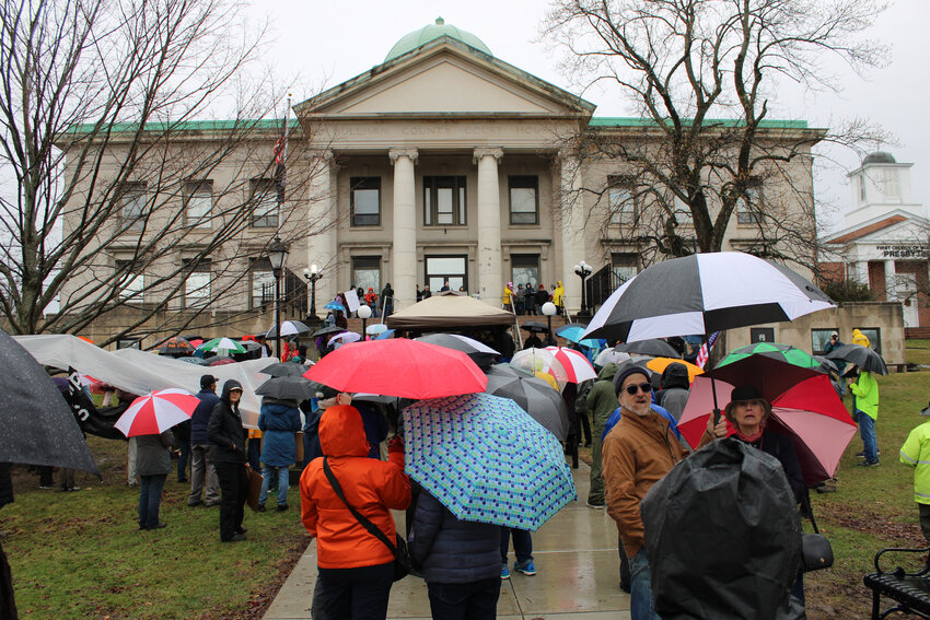 A crowd of concerned Sullivan County residents braved the cold and rain on Saturday to make their voices heard, joining the array of &ldquo;Hands Off&rdquo; protests that sparked up around the nation.