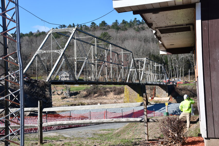 At 9 a.m. yesterday, the Skinners Falls Bridge was waiting to be deconstructed.