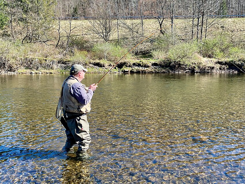 Tom Mason fishing a stretch of the Willowemoc.