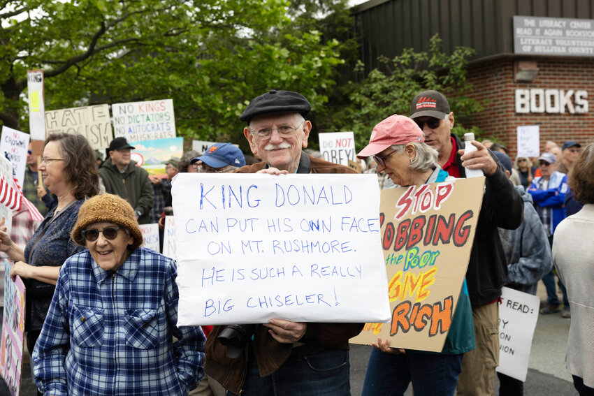 Signs of protest were carried by many in the parade.