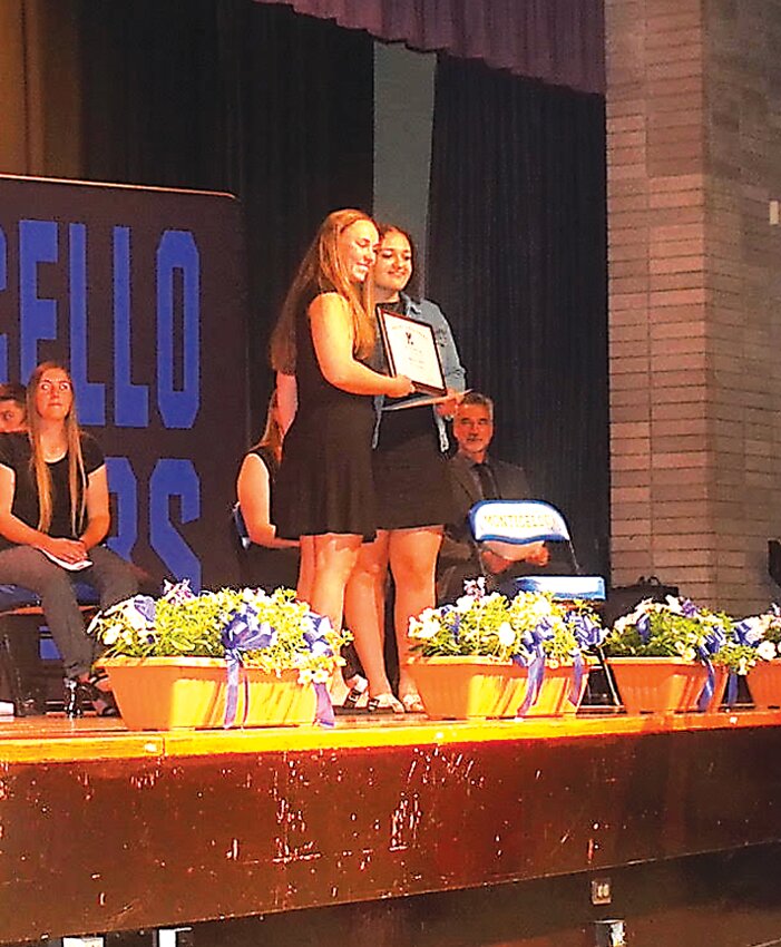 Coach Sheila Burns presents junior, Morgan Hutchins with the  MVP Award for Girls Basketball.
