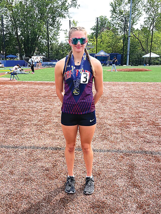 Sophia Richardson won 2nd place in the 200 in Class C and set a new school record in the 400.