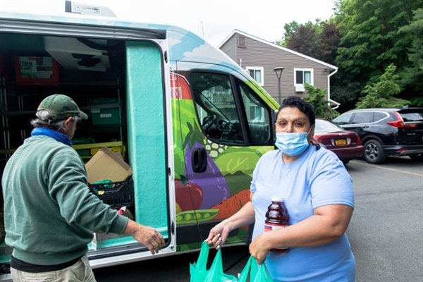 Mary Torres of Woodridge says receiving food deliveries has been a lifesaver for her during the COVID-19 pandemic.