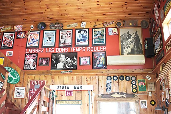 All of the artwork, signs, records and collections of southern memorabilia from the previous Big Willie's Cajun BBQ will remain on the walls of the new Cabernet Frank's.