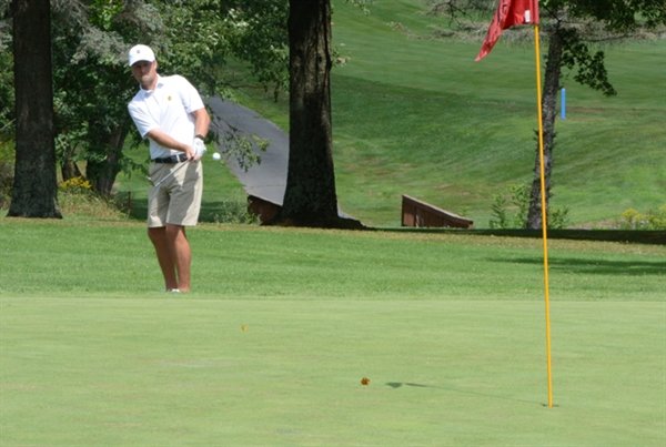 Sean Semenetz chips this ball onto the ninth green, setting up a putt for par, which evened the score heading into the back nine.