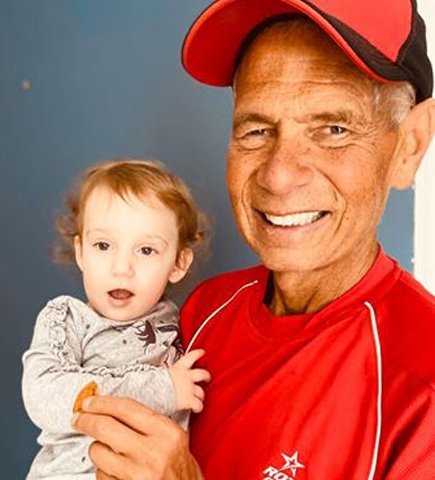 Mike Luongo holding his two-year-old granddaughter, Kimberly "Kimmy" Luongo, daughter of Mickey and Casey Luongo who make their home in Mt. Hope, Middletown.