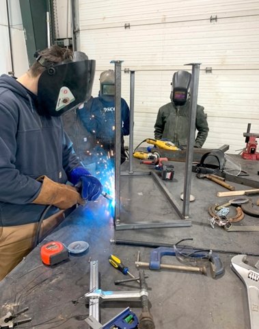 Students and staff from Sullivan County BOCES' career and technical education (CTE) welding and construction programs helped create the workstations for the bus. Pictured is Justyn Zayas, Sullivan BOCES CTE Natural Resources Student from Livingston Manor High School.