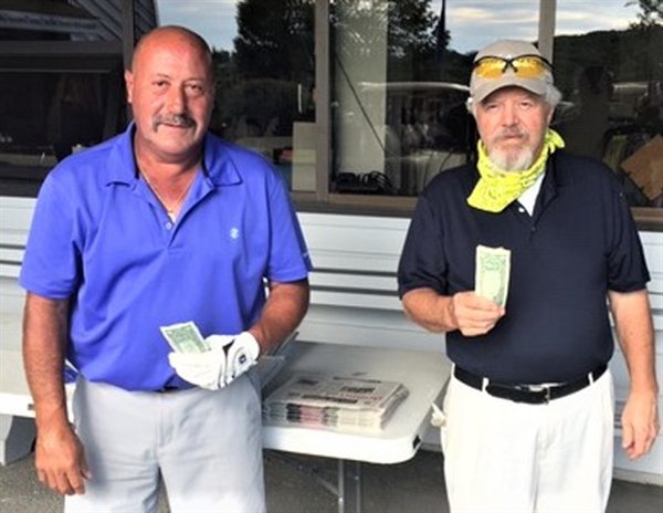 Two hole-in-one aces were scored in the July 23 Villa Roma Thursday Men's League. Recording the scores were Brian Starr, left, and popular Villa Roma Chef Pete Selthafner.