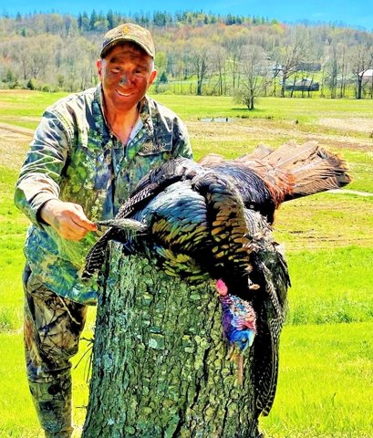 Uncle Mike Scagnelli under the advice of his niece and nephew, who got their first turkeys as seen in last Friday's paper, and took his own gobbler on Saturday that weighed 23.25 pounds, had a 10.5-inch beard and one-inch spurs.
